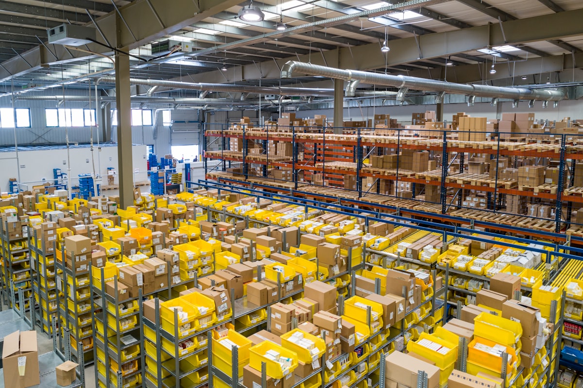 Parcels stacked in a fulfillment warehouse, ready for cash on delivery dispatch in Pakistan